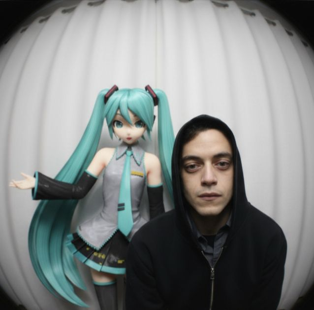 Kunal with a Hatsune Miku figure